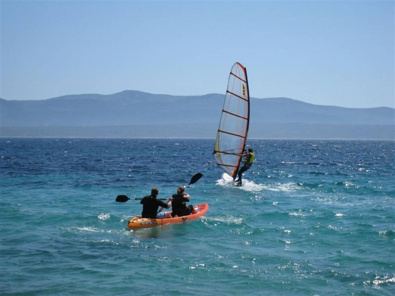Sea kayaking and windsurfing